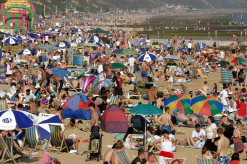 Crowded beach Bournemouth Dorset England UK