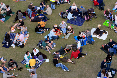 Aerial view of fans lying out in the sunshine at the 2008 Isle of Wight Festival on the Isle of Wight, United Kingdom.