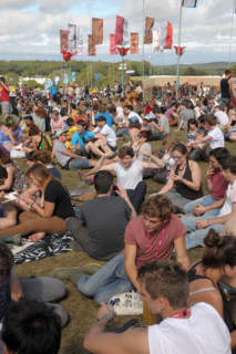 Crowds of music fans at the 2011 Bestival music festival pop concert on the Isle of Wight, England.