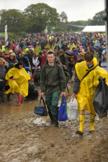 Isle of Wight, england, June 21 2012. Heavy rain and traffic congestion brings chaos to the Isle of Wight festival. Concert reve