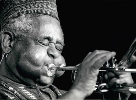 Jul. 07, 1990 - Jazz Festival of Montreux: His eyes shut and cheeks puffed out Dizzie Gillespie is all concentrated effort during the performance of his United Nation Orchestra at the Montreux Jazz Fe...