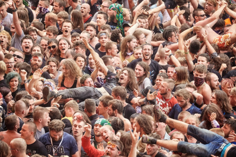 Kostrzyn, Poland - August 05, 2017: People having fun at a concert during the 23rd Woodstock Festival Poland.