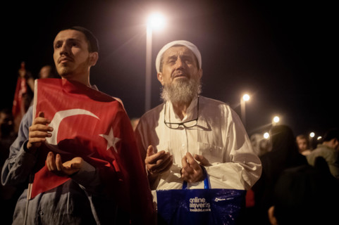 Turkish citizens seen with the Turkish flag during the national unity day. A large crowd of people gathered for the  Meeting at "July 15 Martyrs Bridgeí, previously known as Bosphorus Bridge. The cele...