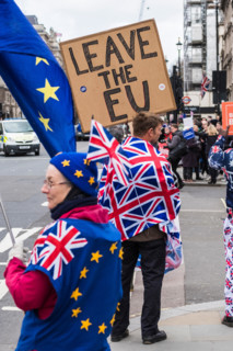 People protesting over Brexit outside of Parliament, Palace of Westminster, London, England, U.K.