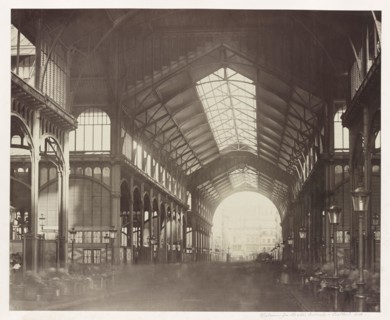 Vintage photo circa 1867 showing inside Les Halles, the central fresh food market of Paris. In the 1850s, Victor Baltard designed the cast iron and glass building which was demolished in 1971