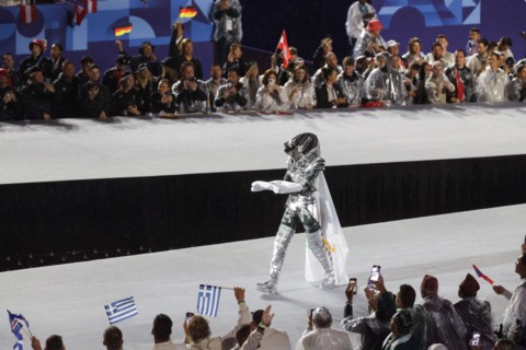 July 26th, 2024 - Paris, France: the Horsewoman wearing a silver and black armour (Floriane Issert) presents the Olympic Flag at Place du Trocadero du
