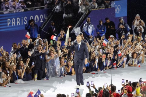 July 26th, 2024 - Paris, France: Zinedine Zidane of France carries the Olympic Torch during the Opening Ceremony of the Paris 2024 Olympics (photo by