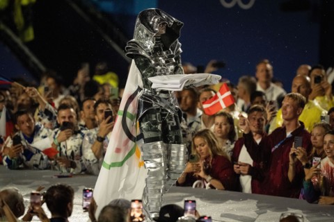 The Olympic flag is carried during the opening ceremony of the 2024 Olympic Games on Friday, July 26, 2024,in Paris, France.