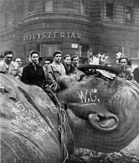 Fallen statue of Stalin in Budapest during the 1956 Hungarian Uprising