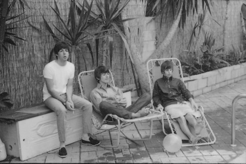 Beatles files 1964 The Beatles relaxing in sun loungers by their swimming pool in Bel Air in California during their first American tour August 1964