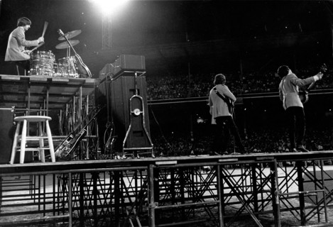 The Beatles during a concert at Shea Stadium
