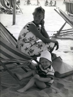 1968 - Paola di Liegi and her family at the beach of Marina di Massa, where they will stay for two months. The little Phillipe enjoys himself on the beach, while his sister Princess Astrid, sleeps on ...