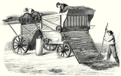 Machine to beat grain sheaves