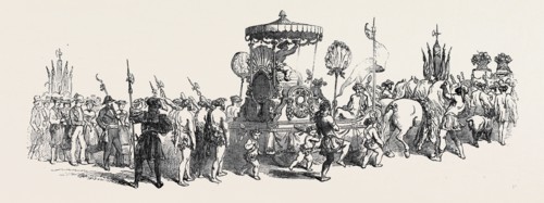 LA FETE DES VIGNERONS, AT VEVEY: THE PEOPLE WALKING ON THE LEFT REPRESENT WINTER; IN THE CENTRE CAN
