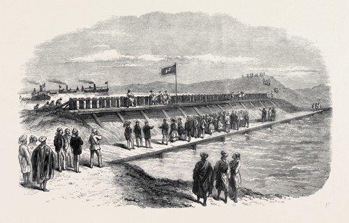 VISIT OF THE PRINCE AND PRINCESS OF WALES TO THE SUEZ CANAL WORKS: THE PRINCE LETTING THE WATERS OF