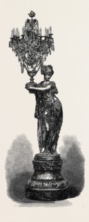 FIGURE HOLDING CANDELABRUM, BY THE COMPAGNIE DES MARBRES ONYX D'ALGERIE, EXHIBITED BY G. VIOT AND