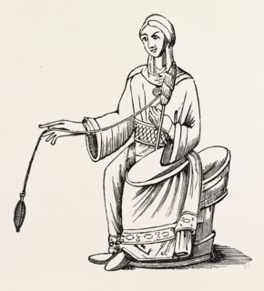 WOMAN SPINNING.