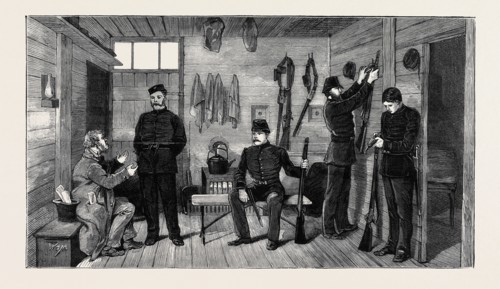 INTERIOR OF A POLICE HUT AT GURRANMORE, PALLAS, COUNTY LIMERICK; ARMING TO ESCORT A PROCESS-SERVER,