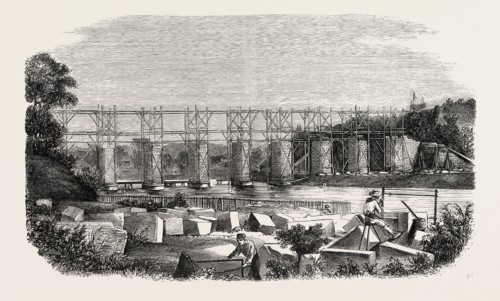 Construction of the viaduct of Mayenne, in Laval (railroad west), France. engraving 1855