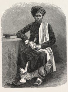 MERCHANT OF SURAT, INDIA. Surat is Gujarat's second largest city and India's 8th most populated