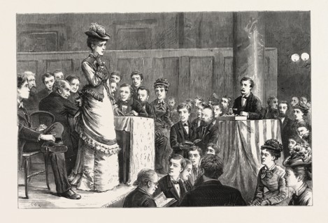A SPELLING BEE: A FAIR COMPETITOR PUZZLED. ENGRAVING 1876, UK, britain, british, europe, united