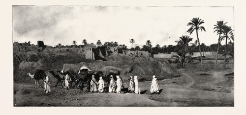 A CARAVAN APPROACHING AN OLD FORT IN BISKRA, engraving 1890