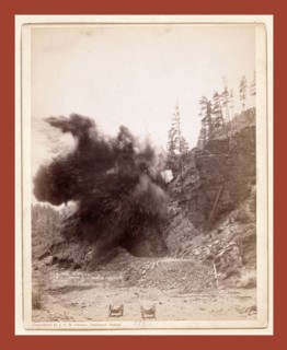 In mid air. A wonderful blast in building railroad to Deadwood, John C. H. Grabill was an american