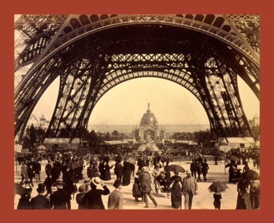 Crowd of people walking under the base of Eiffel Tower, view toward the Central Dome, Paris