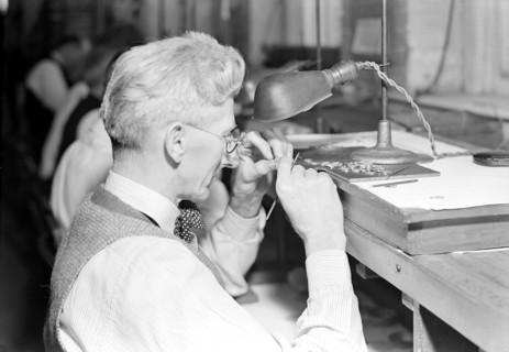 Lancaster, Pennsylvania - Hamilton Watch. Operation - inspecting plate - skilled inspecting job