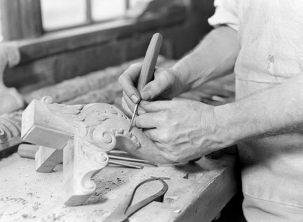 High Point, North Carolina - Upholstering. Tomlinson Chair Manufacturing Co. Hand carver - close-up