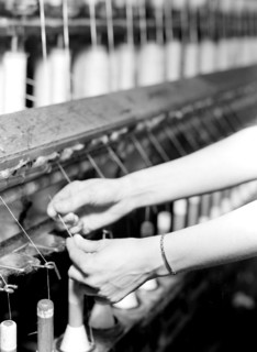 High Point, North Carolina - Textiles. Pickett Yarn Mill. Spinning - Saco-Lowell machine - showing