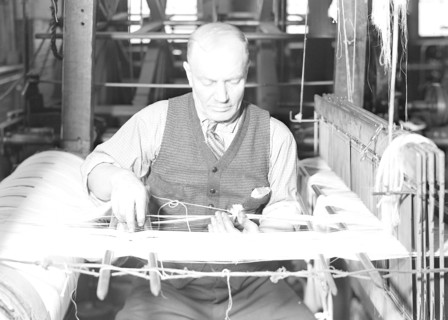 Paterson, New Jersey - Textiles. From the warping machine, the warp is taken to the weaving plant,