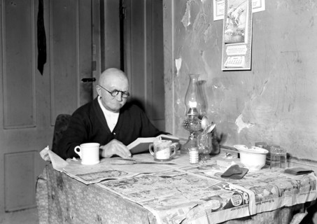 Paterson, New Jersey - Textiles. Living room and 78 year-old silk worker (now retired on $18 a