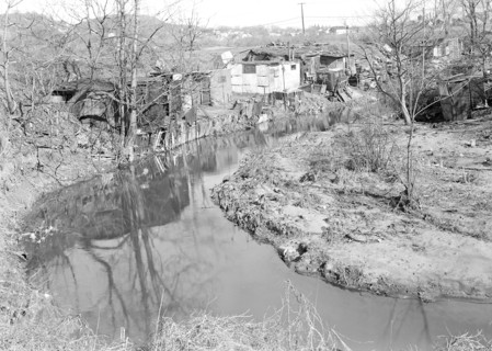 Paterson, New Jersey - Textiles. Bachelor shacks in outskirts of Paterson, on Molly Jan Brook.