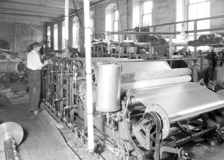 Paterson, New Jersey - Textiles. [Man working at machines.], 1936, Lewis Hine, 1874 - 1940, was an
