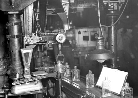 Millville, New Jersey - Glass bottles. [Bottles moving along a conveyor belt.], 1936, Lewis Hine,