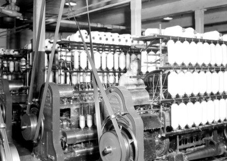 Millville, New Jersey - Textiles. Millville Manufacturing Co. [Man in between machines.], 1936,