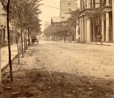 Meeting St., near Broad, Charleston, S.C., looking north. St. Michael's church in the middle