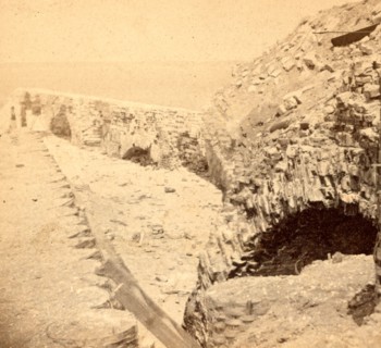 View of Fort Sumpter (i.e. Sumter), on the parapet, overlooking the harbor and distant shore. Fort