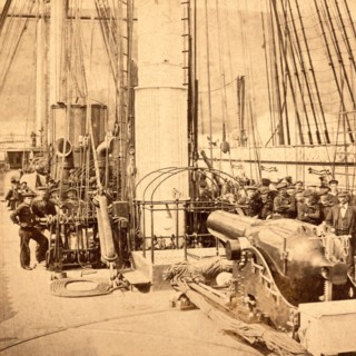 Sailors and a cannon on deck of a gunboat, US, USA, America, Vintage photography