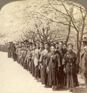Holiday outing of a Japanese school, under the beautiful cherry blossoms, Tokyo, Japan, Vintage