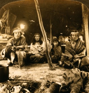 A typical group of Patagonians under their sheepskin tent, a race of South American giants, World's
