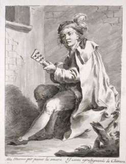 A Seated Man Playing a Guitar