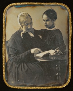 Woman Reading to a Girl