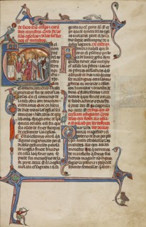 Initial E: A Priest Celebrating Mass