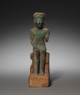 Statuette: Seated Amen-Ra, 715-525 BC. Egypt, Late Period, Dynasty 25-26 (?). Bronze and black