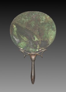 Mirror with Falcons, 1540-1296 BC. Egypt, New Kingdom, Dynasty 18. Mirror of copper, handle of