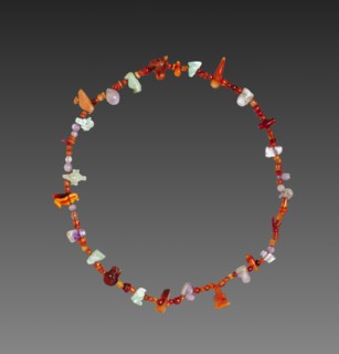 Necklace of Amulets, 1980-1801 BC. Egypt, Middle Kingdom, mostly Dynasty 12. Carnelian, feldspar,