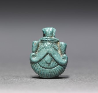 Amulet of a Palmette, 1540-1296 BC. Egypt, New Kingdom, Dynasty 18. Pale blue faience; overall: 1.2