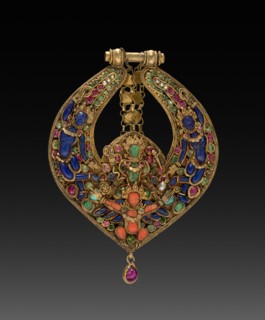 Deity Earring with Vishnu on Garuda (front) and chepu (monster mask) (back), 1600s or 1700s. Nepal,